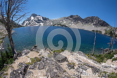 Fisheye view of Sawtooth Lake, a high alpine mountain lake in Central Idaho Stock Photo