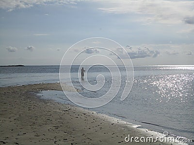 Fishing on the beach Stock Photo