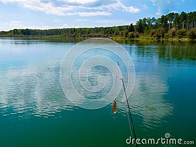 Fishing on a beautiful calm day Stock Photo