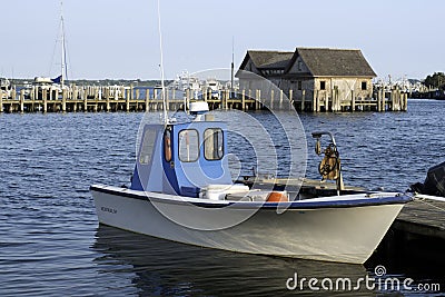 fishing boat in bay harbor marina Montauk New York USA the Hamptons Stock Photo