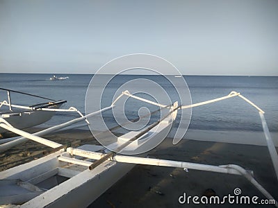 fishing boat on the beachon a sunny morning Stock Photo