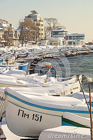 Fishing boat on the coast of the old town of Pomorie in Bulgaria Winter Editorial Stock Photo
