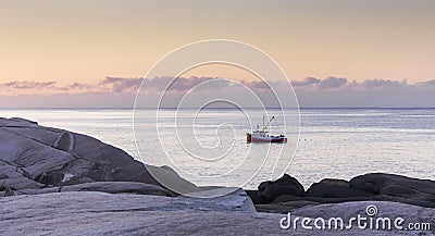 Fishing boat at dawn at Peggy`s Cove in Nova Scotia, Canada Editorial Stock Photo