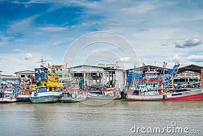 Fishing boat at fresh sea food market Thailand. Stock Photo