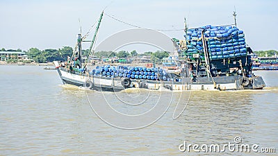 Fishing boat in Hlaing river, Myanmar. They go to off-shore and fishing Editorial Stock Photo