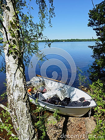 Fishing boat at lake Mien,Sweden Stock Photo