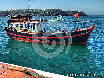 Fishing boat leaving harbor of Quang Ngai, Vietnam Editorial Stock Photo