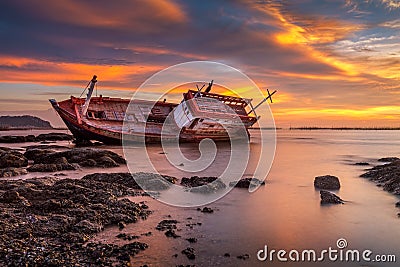 Fishing boat moored on the beach Stock Photo