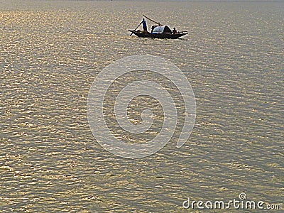 Picture of a fishing boat on a river of eastern India Editorial Stock Photo