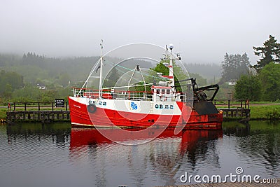 Fishing boat on Scottish canal Editorial Stock Photo