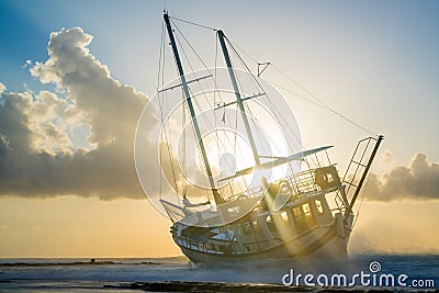 Fishing boat shipwreck or abandoned shipwreck. , Wrecked boat abandoned stand on beach in RHodes Stock Photo