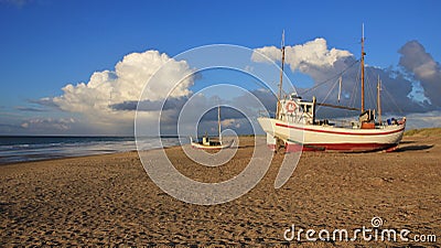 Fishing boat on the shore Stock Photo