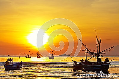 Fishing boat sunrise Stock Photo