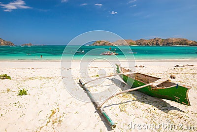 Fishing boat on Tanjung Aan Beach - Lombok, Indonesia. Stock Photo