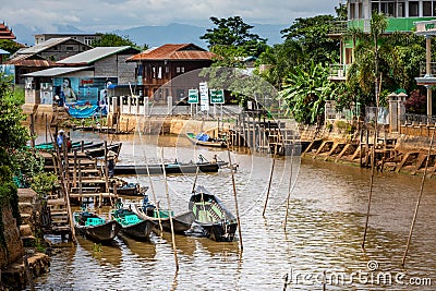 Fishing boats along the Inle canal river. Myanmar, Burma Editorial Stock Photo