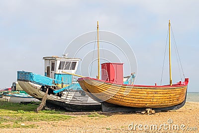 Fishing boats on the beach and left to rot. Editorial Stock Photo