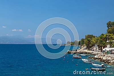 Fishing boats at the coast of Greece in Loutraki Stock Photo