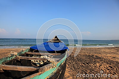 Fishing boats docked on a beach Stock Photo