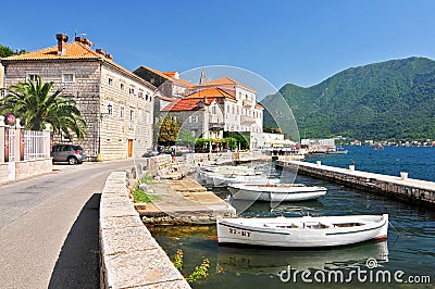 Fishing boats float moored in Perast town. Kotor Bay Montenegro. Editorial Stock Photo