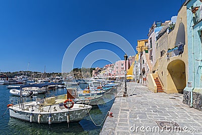 Fishing boats in the harbor in Marina di Corricella, Procida Island, Gulf of Naples, Italy Editorial Stock Photo