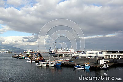 Fishing boats moored at the pier of the fishing port in the harbor, Ponta Delgada, Sao Miguel, Azores, Portugal Editorial Stock Photo