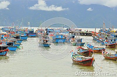 Fishing boats are mooring in a seaport of Nha Trang Editorial Stock Photo