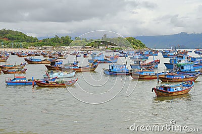 Fishing boats are mooring in a seaport of Nha Trang Editorial Stock Photo