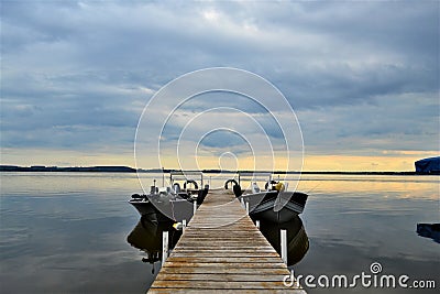 Boats resting on Shawano lake in Wisconsin. Stock Photo