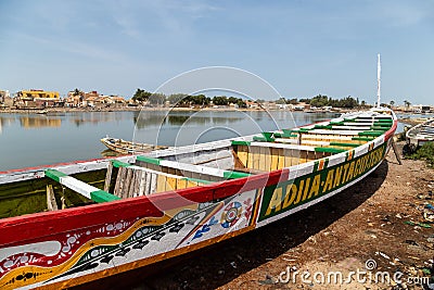 Fishing boats resting on the riverbank of the river senegal Editorial Stock Photo