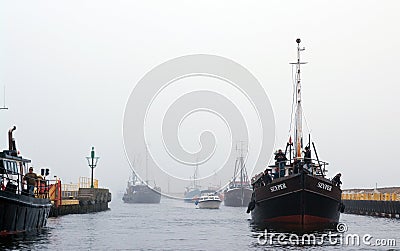 Fishing boats return Editorial Stock Photo