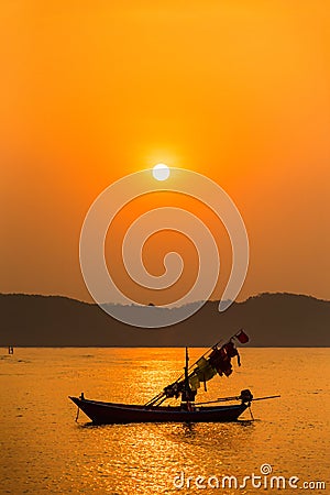 Fishing boats, small boats floating in the sea at sunrise, Concept sea in the morning Stock Photo