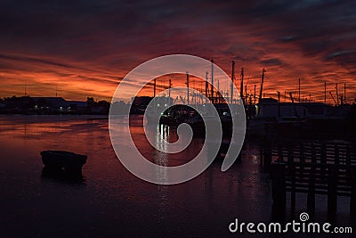 Fishing boats at sunset in Marina Stock Photo