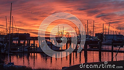 Fishing boats at sunset in Marina Stock Photo