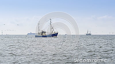 Fishing boats trawling Stock Photo