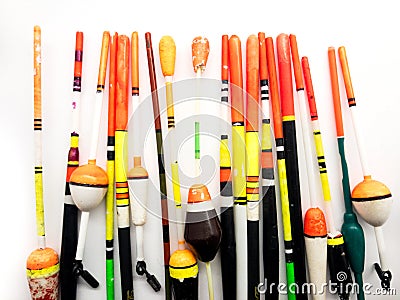 Fishing bobbers on a white background. Composition of plastic fishing floats. Stock Photo