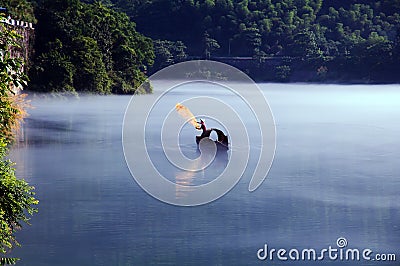 Fishing on Dongjiang Lake Stock Photo
