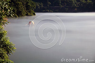 Fishing on the Dongjiang Lake Stock Photo