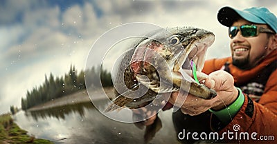 Fishing. Fisherman and trout. Stock Photo