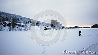 Fishing on a frozen lake. Editorial Stock Photo