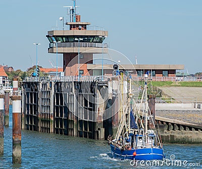 Fishing harbor in North Sea Schleswig-Holstein with various fish cutters Stock Photo