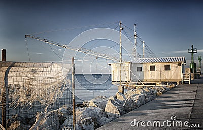 Fishing hut on the harbour channel Stock Photo