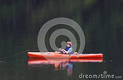 Fishing from Kayak Stock Photo