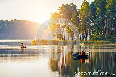 Fishing in a lake at sunshine Stock Photo