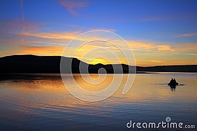 Fishing on morning lake Stock Photo