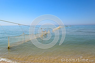 Fishing nets set in the sea. Fishing nets Stock Photo