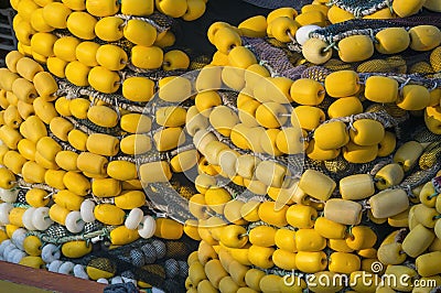 Fishing Nets With Yellow Plastic Floats Stock Photo