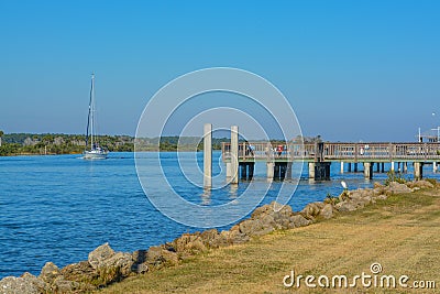 A Fishing Pier on the Intracoastal Waterway at Bings landing, Flagler County, Florida Stock Photo