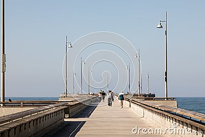 Fishing Pier of Venice Beach on the sea under the sunlight at daytime in Florida Editorial Stock Photo