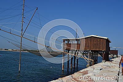 Italy, Italia, Adriatic Sea, sun, tourism, fish, pier, Sottomarina, blue sky, sammer, beach Stock Photo