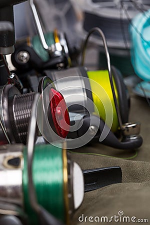 Fishing reels with line different colors Stock Photo